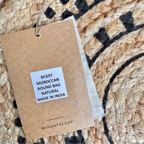 The Shanty Moroccan Round Crossbody Woven Jute Straw Beach Bag in Natural - Picture 8 of 11